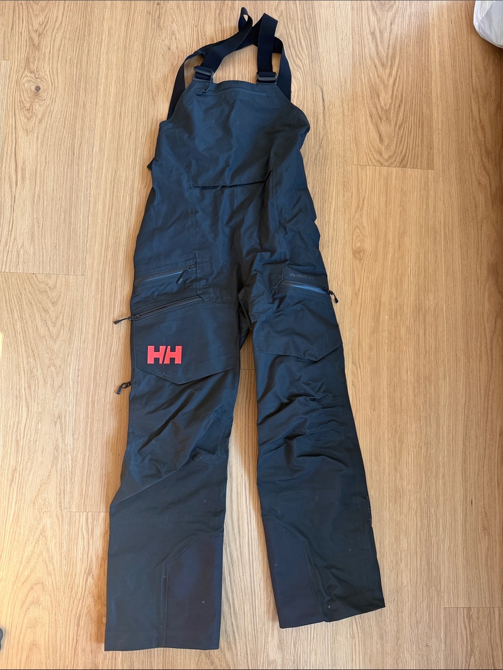 Helly Hansen Lifa Infinity Pro Black Bib Snow Pants with Red HH Logo